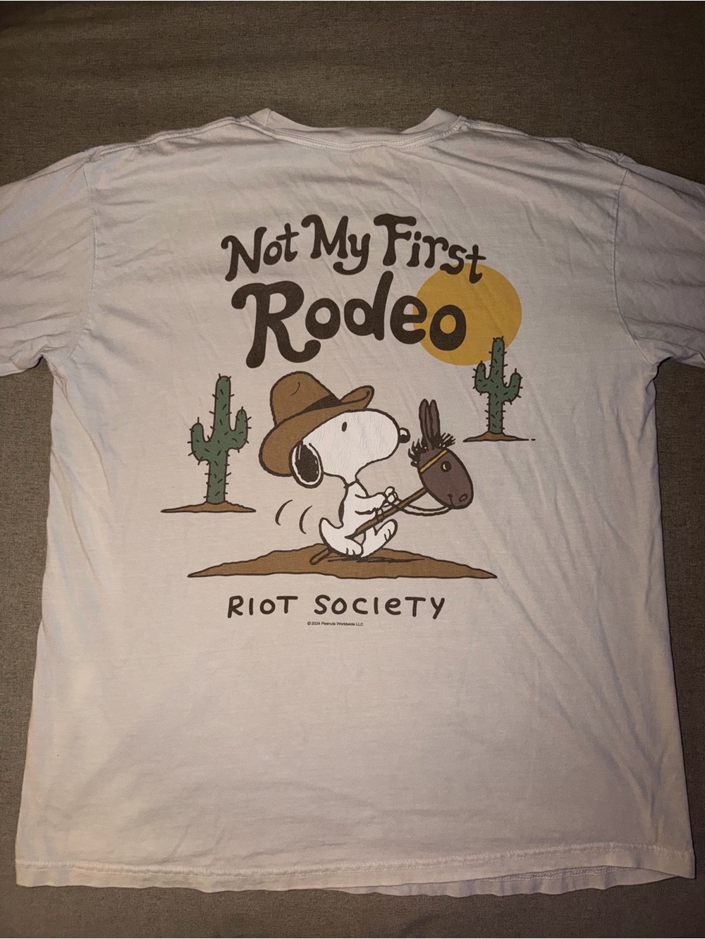 riot society White Graphic Tee with Brown & Green Rodeo Snoopy Print